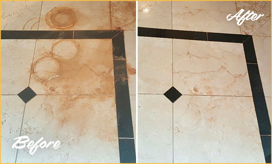 Before and After Picture of a Emerald Isle Marble Floor Cleaned to Eliminate Rust Stains