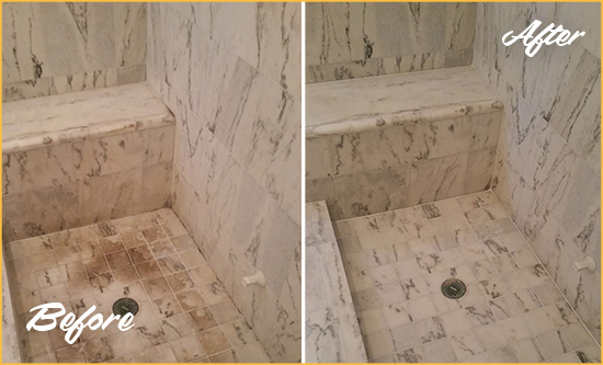Before and After Picture of a Sneads Ferry Marble Shower Honed to Remove Dark Stains